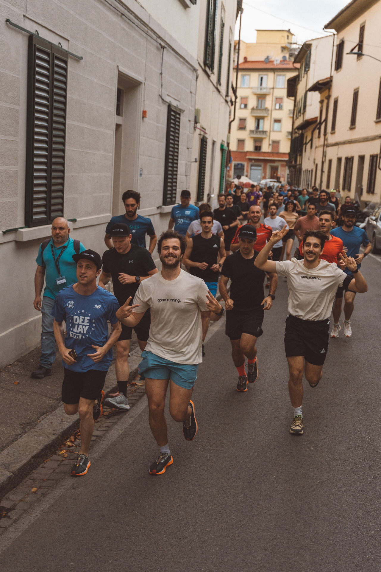Runners of Florence community running together through Florence